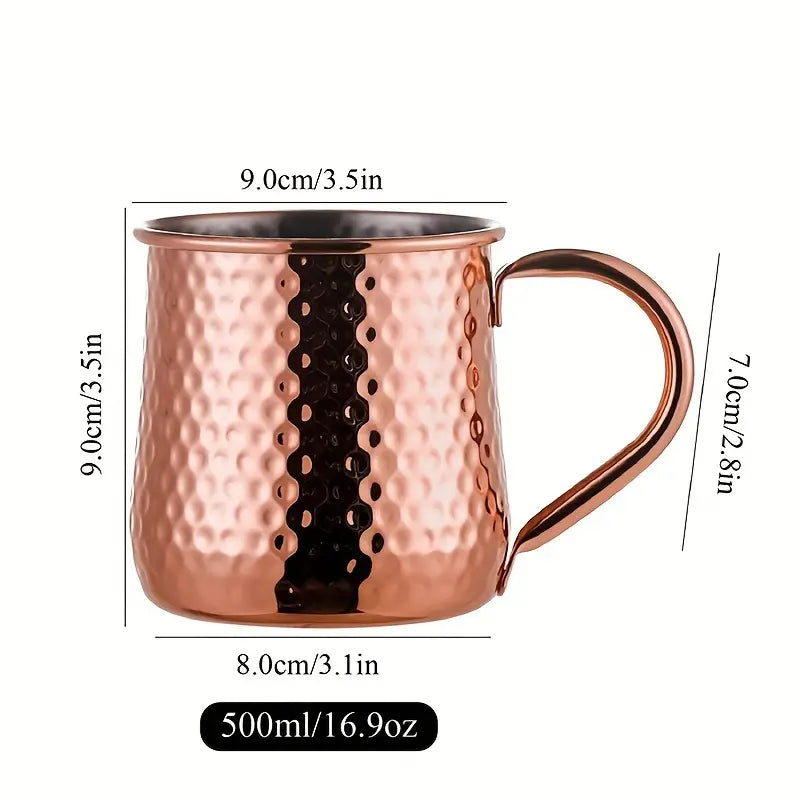 Classic Stainless Moscow Mule Mug With Hammered Copper Exterior Pattern | Oak & Sugar | The Classic Stainless Moscow Mule Mug: Where Luxe Meets Fizz Calling all cocktail connoisseurs and aficionados of extraordinary experiences! Are you ready to elevate y