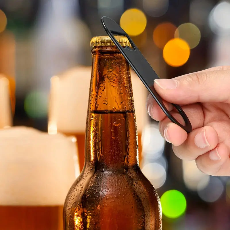 Stainless Steel Multipurpose Bottle Opener, Classic Black | Oak & Sugar | Crafted from durable stainless steel, this classic bottle opener is designed to withstand frequent use and maintain its timeless look for years to come. The black finish adds a touc