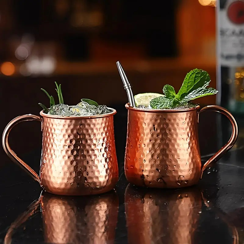 Classic Stainless Moscow Mule Mug With Hammered Copper Exterior Pattern | Oak & Sugar | The Classic Stainless Moscow Mule Mug: Where Luxe Meets Fizz Calling all cocktail connoisseurs and aficionados of extraordinary experiences! Are you ready to elevate y