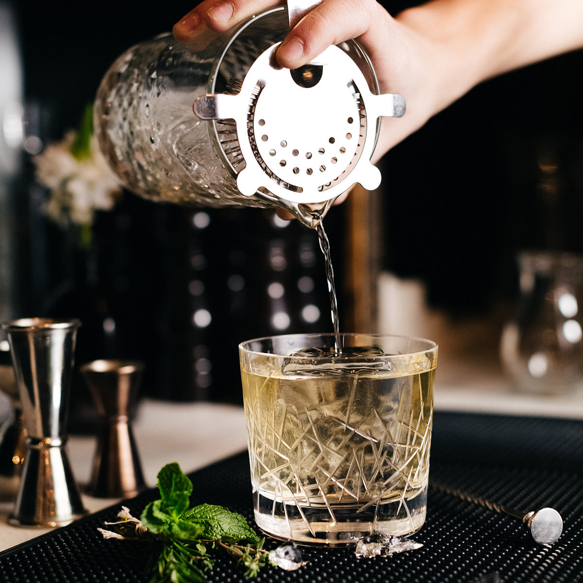 Classic Double Ear Stainless Cocktail Spring Strainer, Ice Strainer | Oak & Sugar | Expertly crafted with high-quality stainless steel, this strainer is designed to effortlessly strain all types of cocktails for a flawless drinking experience. Featuring a