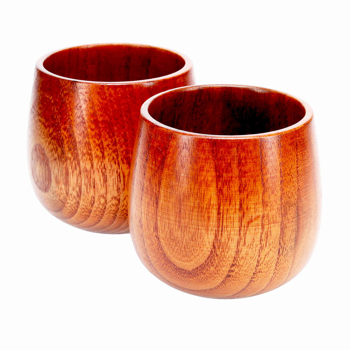 Two beechwood cups with a smooth, polished surface and a rich, reddish-brown color. The 2 Piece Japanese Style Small Wooden Cup by TM has a rounded, slightly tapered shape and an open top. They are placed side by side against a white background.
